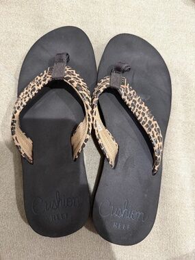 Reef Cushion cheetah print flip flops